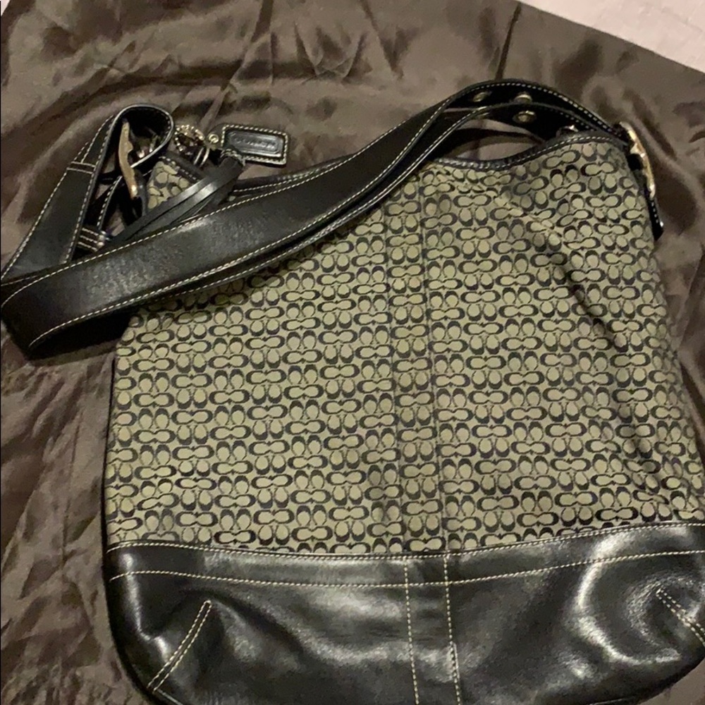 Black & gray shoulder coach bag.